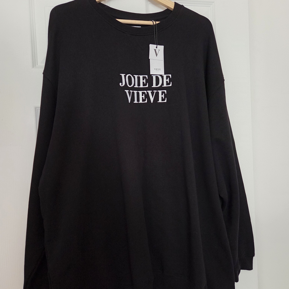 Black and White Crew Neck Sweater with Bold Text